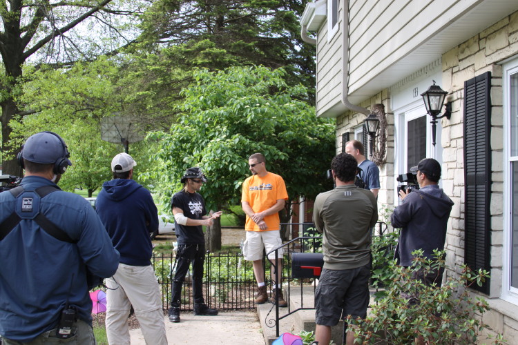 Brad and Billy the Exterminator greeting a customer on a Suburban Wildlife Control job