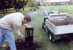 Brad Removing Raccoon from Golf Course