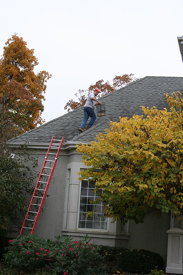 Brad putting traps on roof